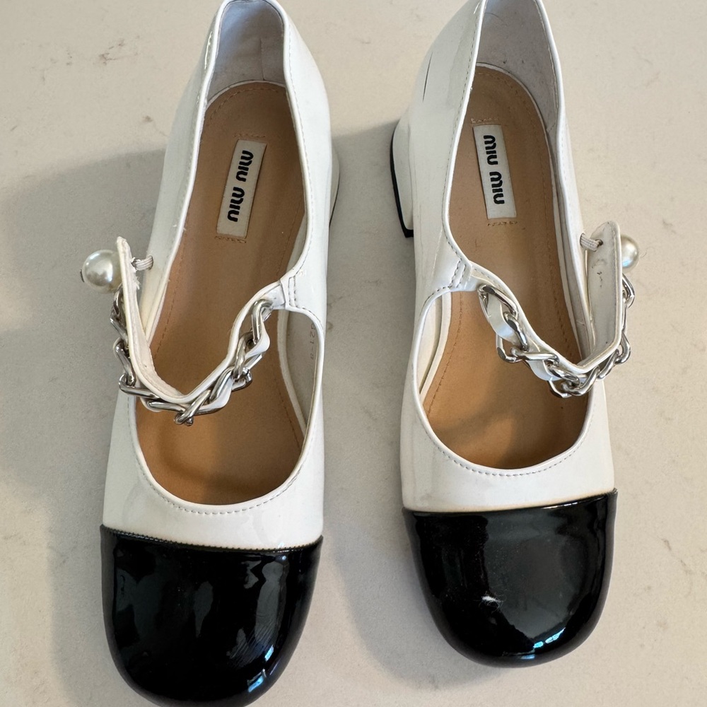 Miu Miu White Leather Mary Janes with Black Patent Toe and Silver Chain